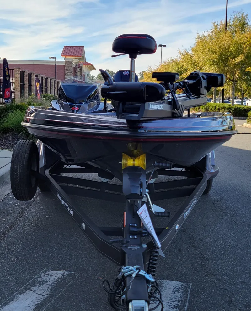 Slide: The Image of 2024 Ranger Z519 Ranger Cup Equipped boat on trailer in parking lot. - 1