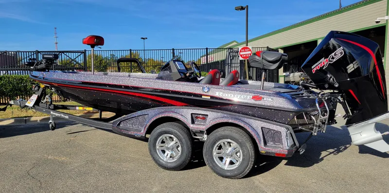 Slide: The Image of 2024 Ranger Z519 Ranger Cup Equipped boat with trailer, parked outdoors. - 5