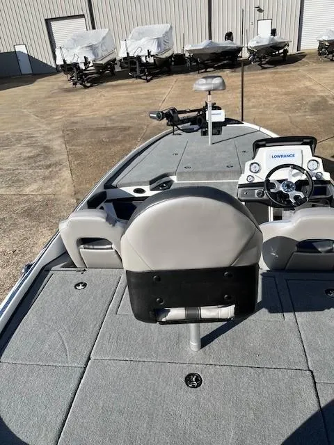 Slide: The Image of 2024 Nitro Z20 Pro fishing boat interior with steering console and deck. - 3