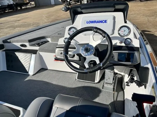Slide: The Image of 2024 Nitro Z20 Pro boat dashboard with Lowrance electronics and steering wheel. - 4