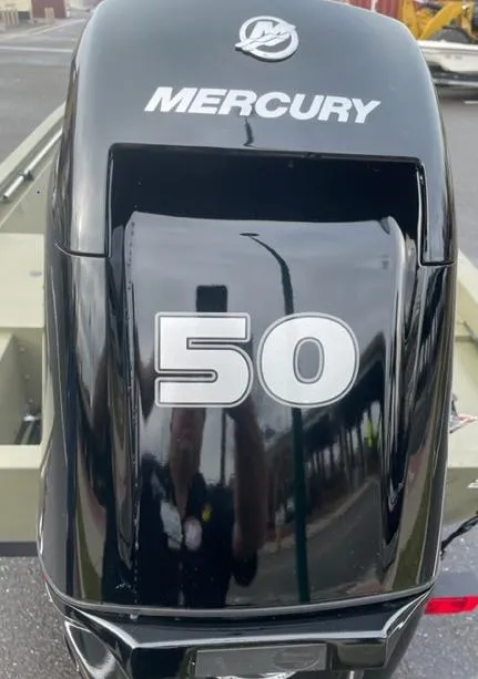 Slide: The Image of 2024 Tracker Grizzly 1648 SC with Mercury 50 HP outboard motor. - 6