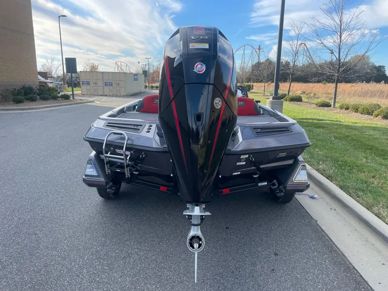Slide: The Image of 2024 Ranger Z519 boat rear view with powerful outboard motor. - 2