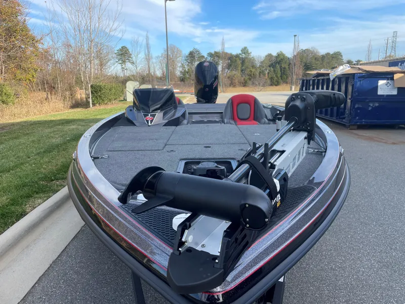 Slide: The Image of 2024 Ranger Z519 fishing boat with trolling motor on a sunny day. - 3