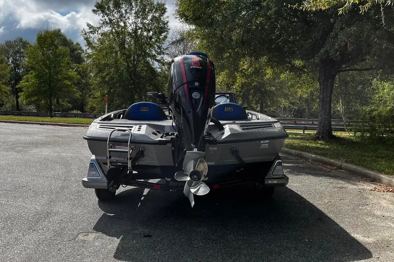 Slide: The Image of 2024 Ranger Z518 Ranger Cup Equipped boat parked outdoors, rear view. - 4