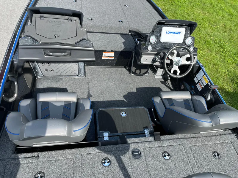 Slide: The Image of 2024 Nitro Z20 Pro boat interior with dual seats and Lowrance navigation system. - 1
