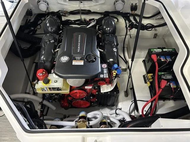 Slide: The Image of 2024 Cobalt R4 Surf engine compartment with Volvo Penta V8 engine and dual batteries. - 10