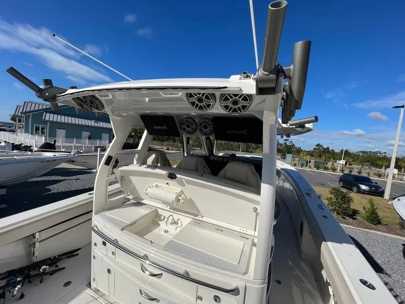 Slide: The Image of 2022 Solace 41 CS boat interior with open storage compartments and modern design. - 15