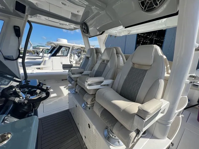 Slide: The Image of 2022 Solace 41 CS boat interior with luxurious seating and modern design. - 16