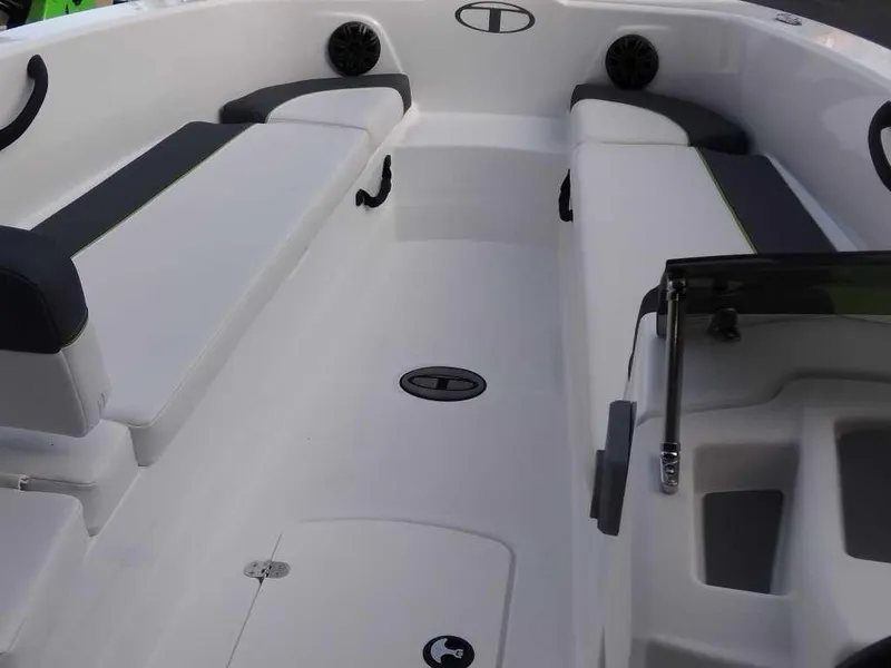 Slide: The Image of 2024 Tahoe T18 boat interior with seating and speakers. - 12