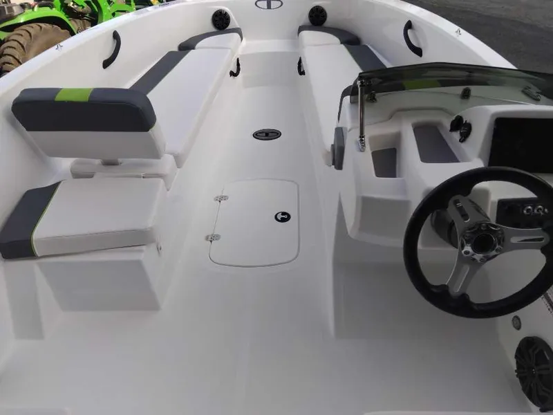 Slide: The Image of 2024 Tahoe T18 boat interior with seating and steering wheel. - 8