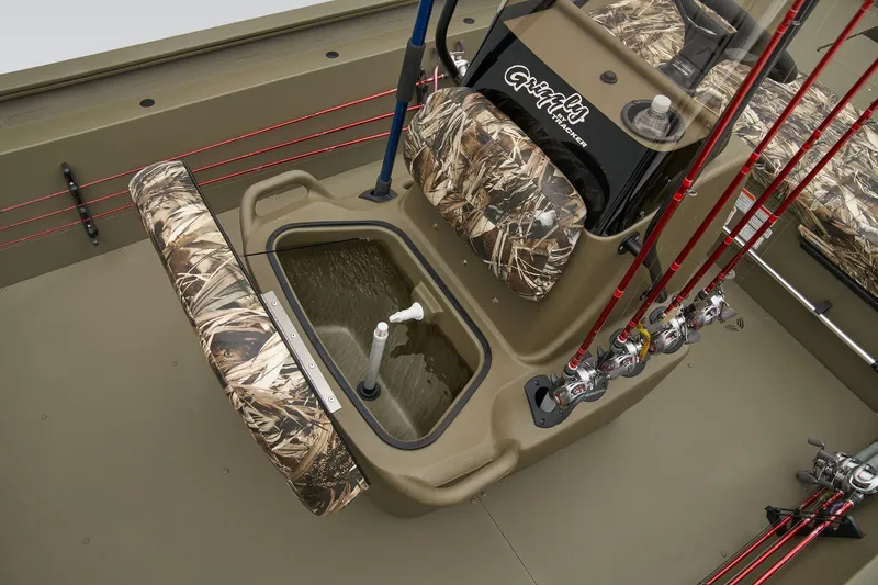 Slide: The Image of 2024 Tracker Grizzly 1860 CC boat on snowy ground, front view. - 12