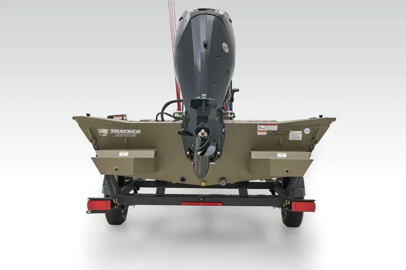 Slide: The Image of 2024 Tracker Grizzly 1860 CC boat on trailer in snowy landscape. - 23