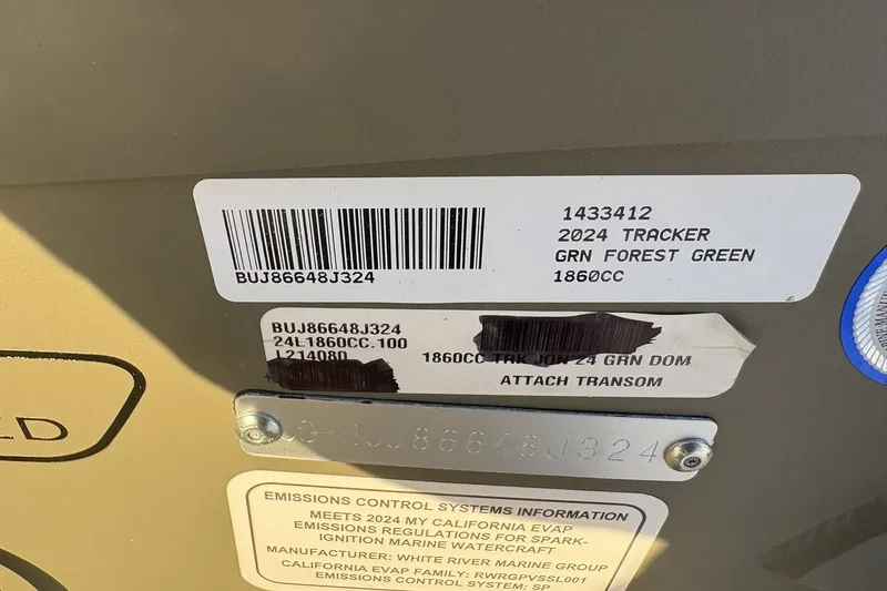 Slide: The Image of 2024 Tracker Grizzly 1860 CC boat label, green color, emissions information visible. - 27