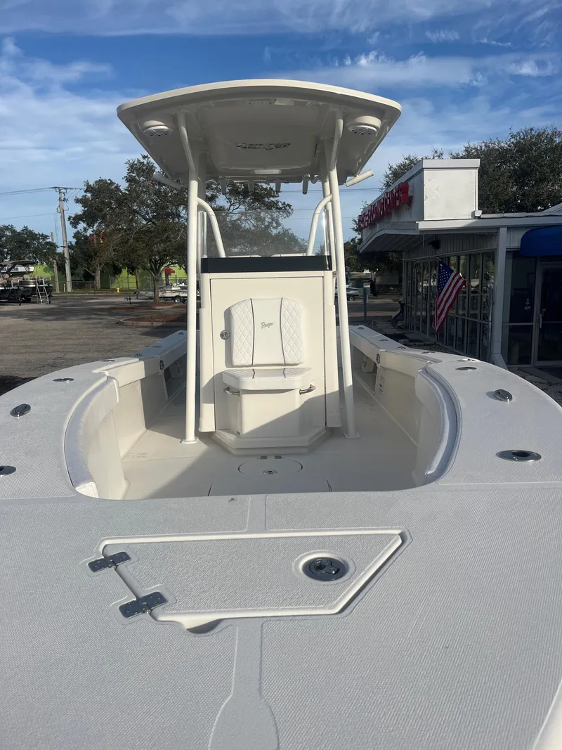 Slide: The Image of 2024 Ranger 2600 Bay boat with T-top and spacious deck. - 3