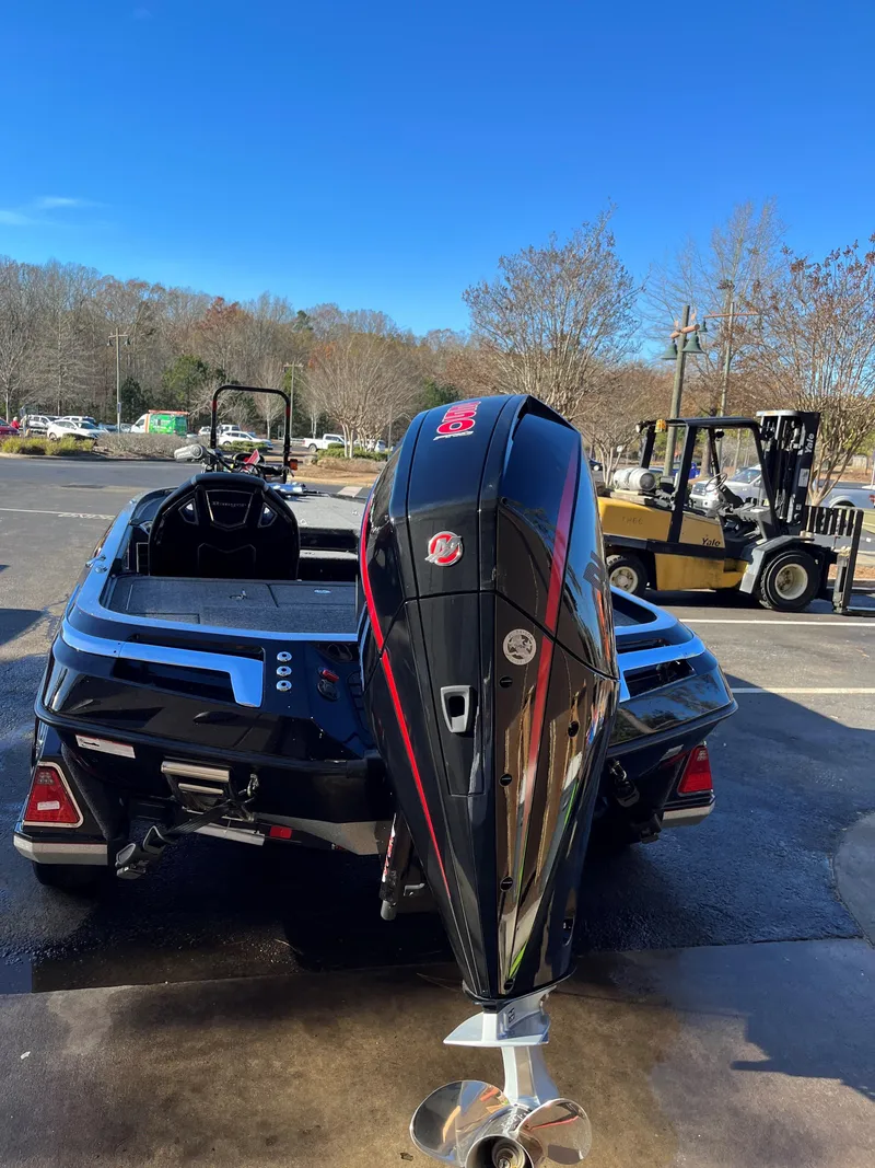 Slide: The Image of 2024 Ranger Z521R Ranger Cup Equipped boat with powerful outboard motor. - 2