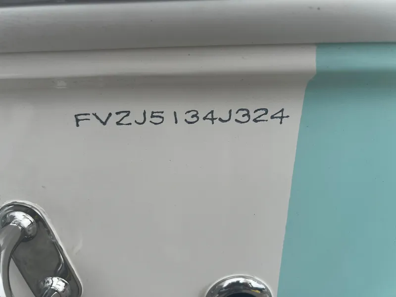 Slide: The Image of Pioneer 180 Islander 2025 boat hull identification number (HIN) close-up. - 10