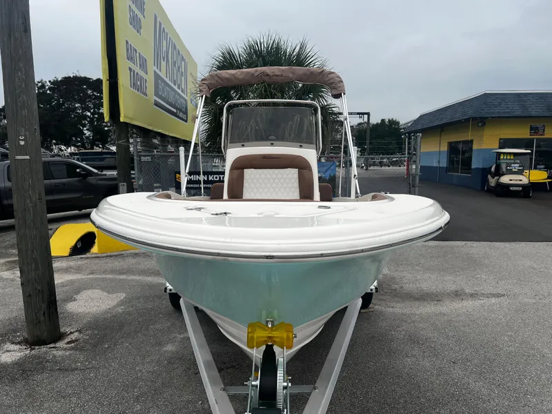 Slide: The Image of 2025 Pioneer 180 Islander boat on trailer at dealership. - 7