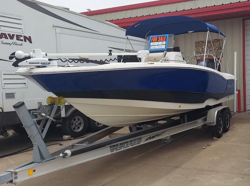 Slide: The Image of 2017 NauticStar 231 Coastal boat for sale on trailer. - 19