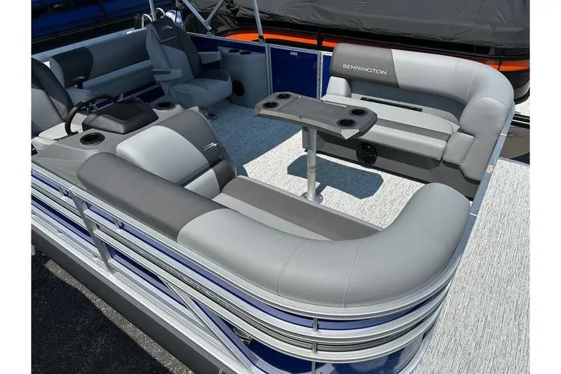 Slide: The Image of 2026 Bennington 20 SSB Swing Back pontoon boat with spacious seating and table. - 12