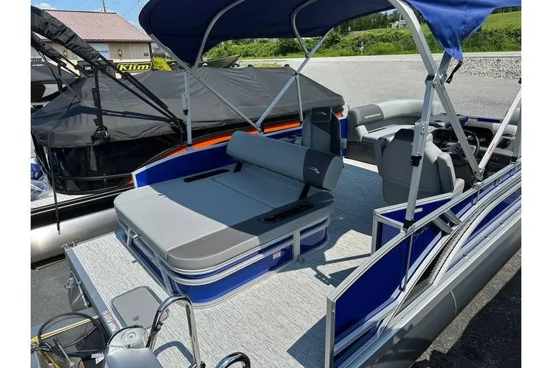 Slide: The Image of 2026 Bennington 20 SSB Swing Back pontoon boat with spacious seating and canopy. - 16