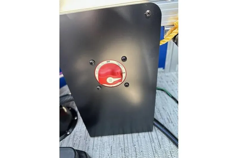 Slide: The Image of Red switch on Bennington 20 SSB Swing Back 2026 boat panel. - 17