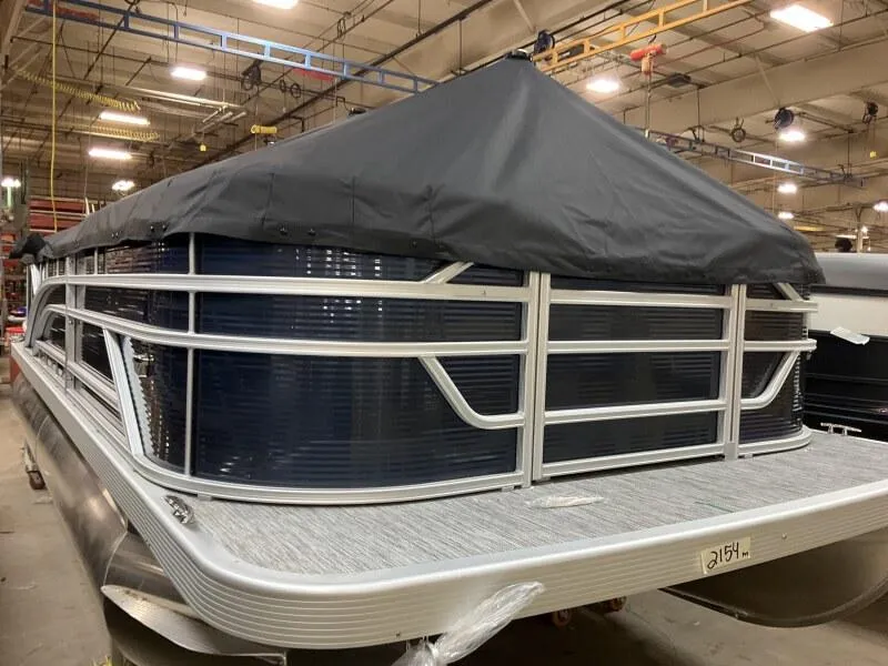 Slide: The Image of 2025 Bennington 20 SSR Quad Bench pontoon boat in stock, covered and ready for sale. - 10