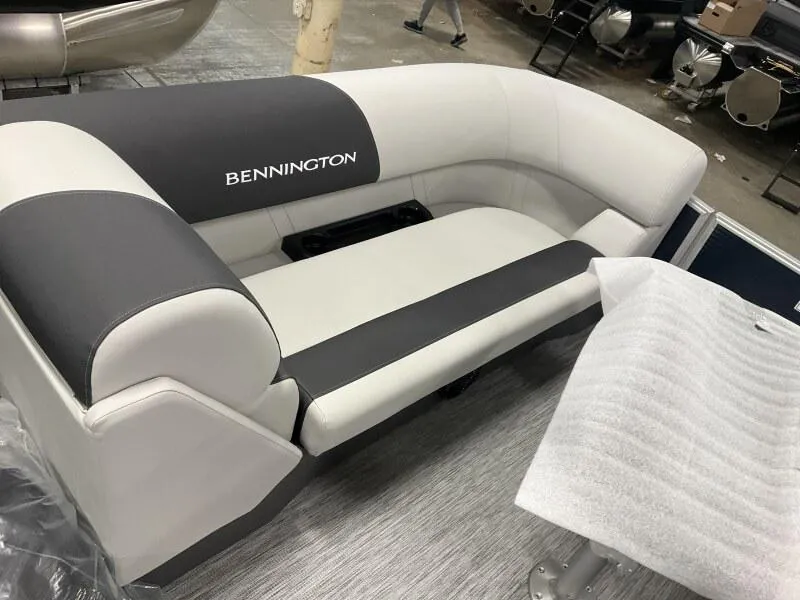 Slide: The Image of 2025 Bennington 20 SSR Quad Bench, sleek gray and black boat seating. - 23