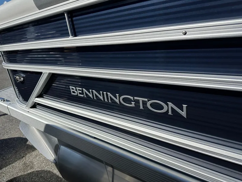 Slide: The Image of 2025 Bennington 20 SSR Quad Bench pontoon boat, close-up of sleek exterior design. - 30