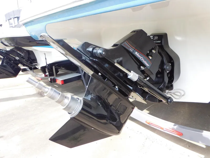 Slide: The Image of 2024 Crownline 240 SS boat trailer with black wheel and winch system. - 12