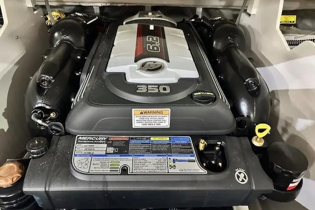 Slide: The Image of 2024 Crownline 240 SS boat engine, featuring a Mercury 6.2L 350 horsepower motor. - 19