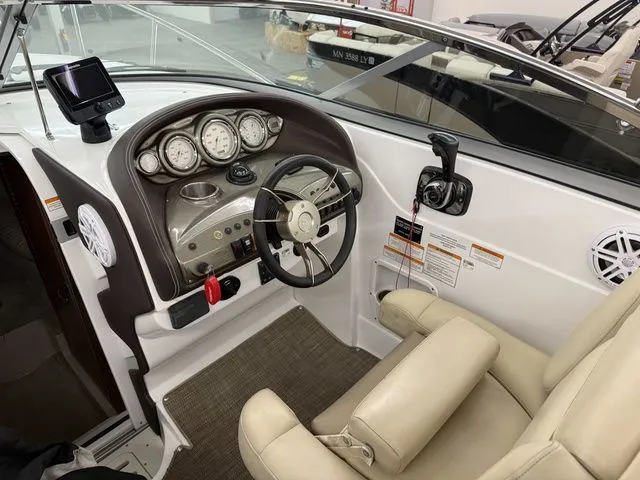 Slide: The Image of Interior view of 2014 Cruisers Yachts 275 Express cockpit. - 27