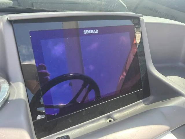 Slide: The Image of Simrad display on 2023 Bennington 25 RFBWA Tritoon dashboard. - 14