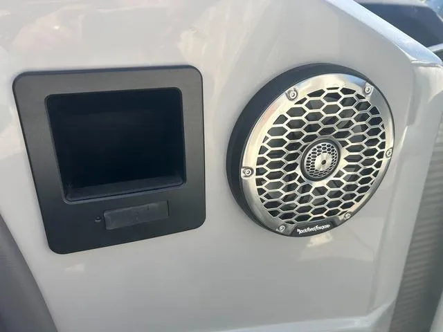 Slide: The Image of Close-up of a 2023 Bennington 25 RFBWA Tritoon speaker and panel. - 15