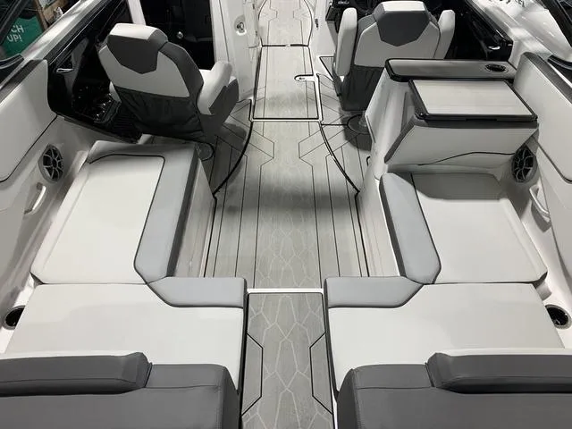 Slide: The Image of 2023 Yamaha Boats 252XE interior with sleek seating and modern design. - 6