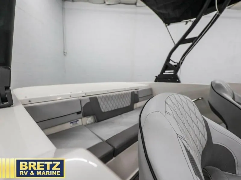 Slide: The Image of 2024 VR Series VR4 boat interior with gray seating and modern design. - 13