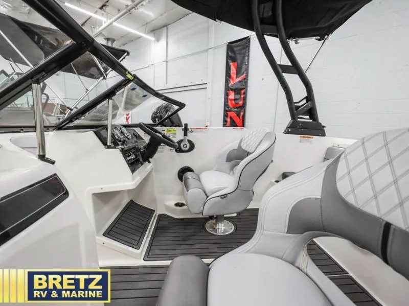 Slide: The Image of Interior of 2024 VR Series VR4 boat with modern seating and controls at Bretz RV & Marine. - 16