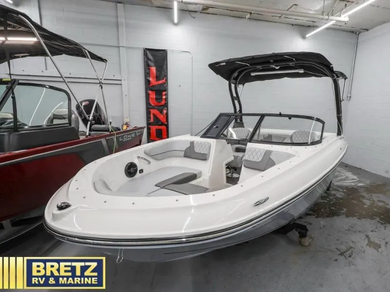 Slide: The Image of 2024 VR Series VR4 boat displayed at Bretz RV & Marine showroom. - 4