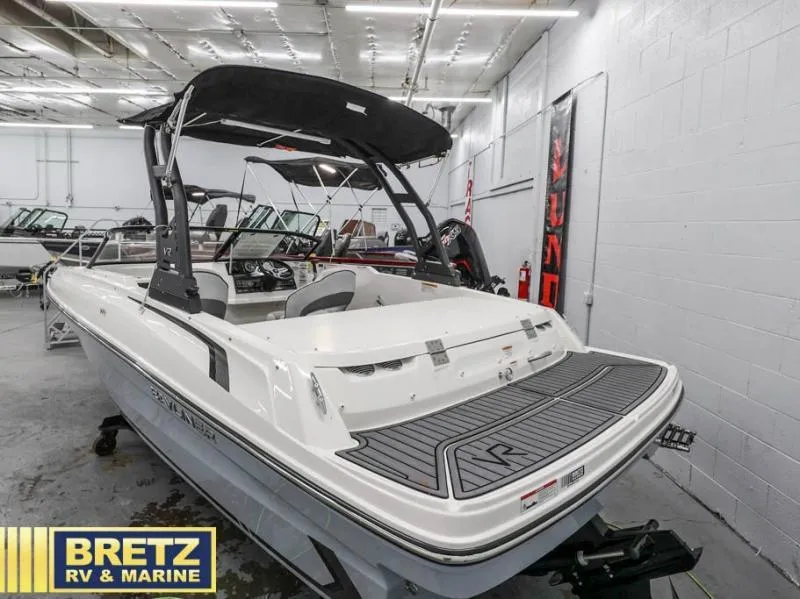 Slide: The Image of 2024 VR Series VR4 boat in showroom, featuring sleek design and modern amenities. - 7