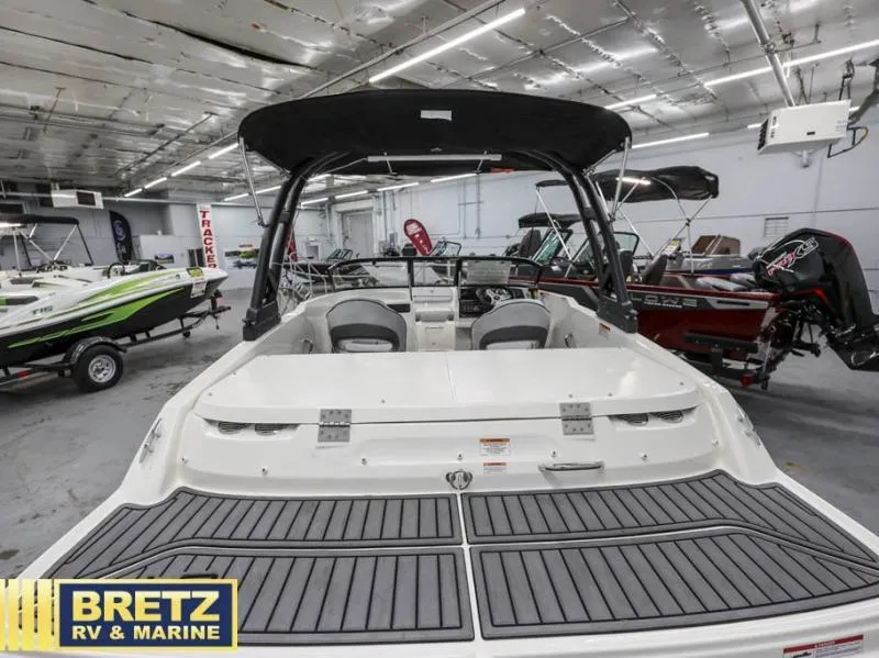 Slide: The Image of 2024 VR Series VR4 boat displayed at Bretz RV & Marine showroom. - 9