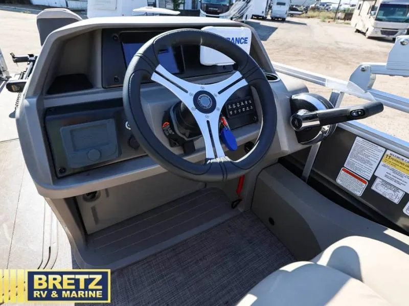 Slide: The Image of 2024 Fishin' Barge 22 XP3 steering console at Bretz RV & Marine dealership. - 14