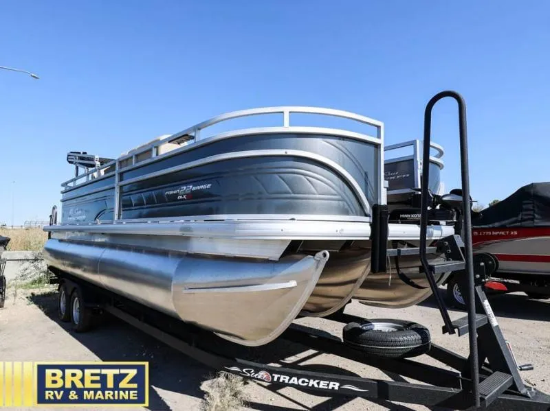 Slide: The Image of 2024 Fishin' Barge 22 XP3 pontoon boat on trailer at Bretz RV & Marine. - 3