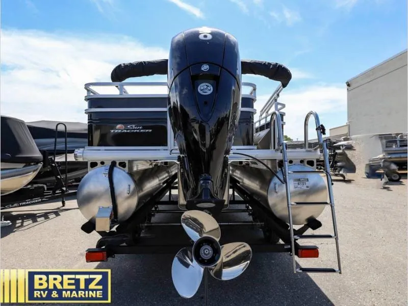 Slide: The Image of 2024 Sportfish 22 DLX boat rear view with motor and ladder at Bretz RV & Marine. - 6