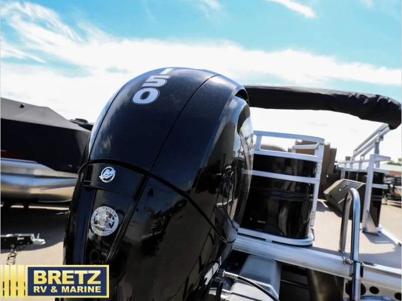 Slide: The Image of 2024 Sportfish 22 DLX boat with a 150 HP outboard motor at Bretz RV & Marine. - 7