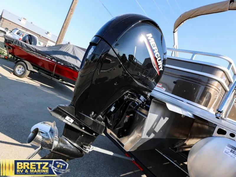 Slide: The Image of 2024 Sportfish 22 XP3 with Mercury outboard motor at Bretz RV & Marine. - 12