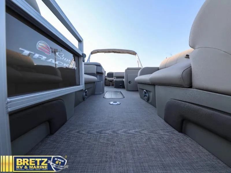 Slide: The Image of 2024 Sportfish 22 XP3 pontoon boat interior with spacious seating and modern design. - 14