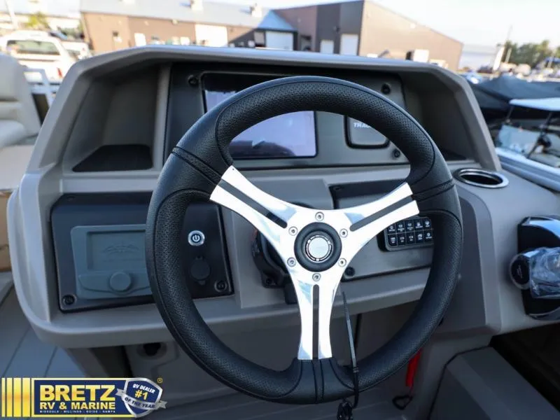 Slide: The Image of 2024 Sportfish 22 XP3 boat steering wheel and dashboard at Bretz RV & Marine. - 16