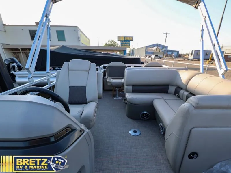 Slide: The Image of 2024 Sportfish 22 XP3 pontoon boat interior at Bretz RV & Marine dealership. - 18