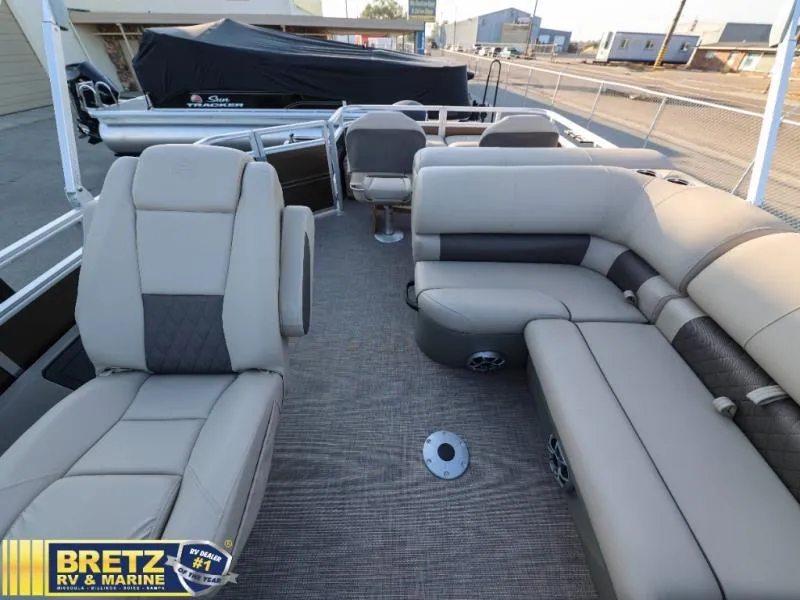 Slide: The Image of 2024 Sportfish 22 XP3 pontoon boat interior with plush seating at Bretz RV & Marine. - 20
