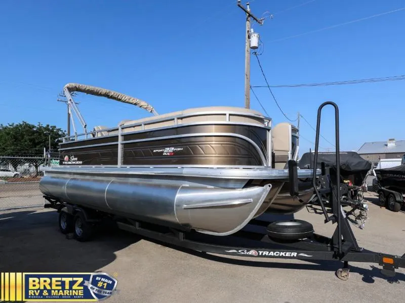 Slide: The Image of 2024 Sportfish 22 XP3 pontoon boat on trailer at Bretz RV & Marine dealership. - 3