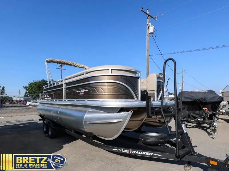 Slide: The Image of 2024 Sportfish 22 XP3 pontoon boat on trailer at Bretz RV & Marine dealership. - 4